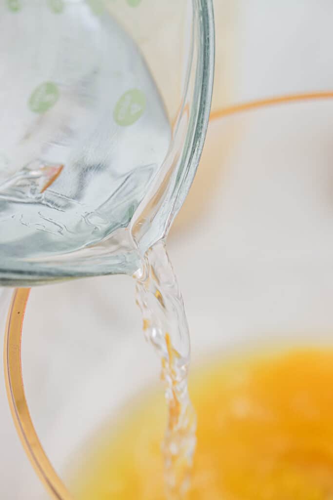Water being added to the punch bowl.