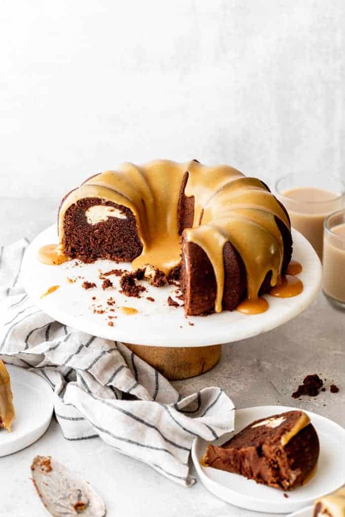 Beautiful chocolate bundt cake with white chocolate ganache glaze
