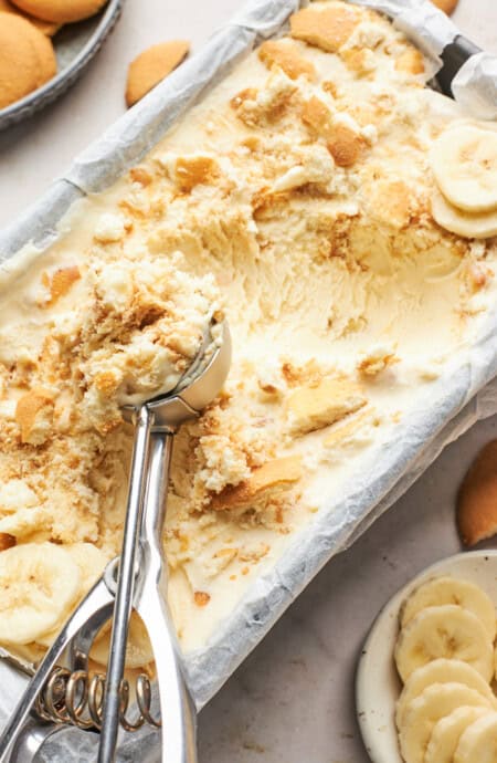 Banana pudding ice cream being scooped to serve