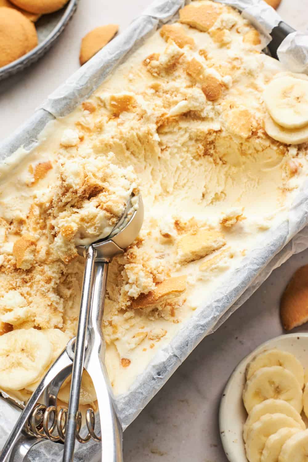 Banana pudding ice cream being scooped to serve