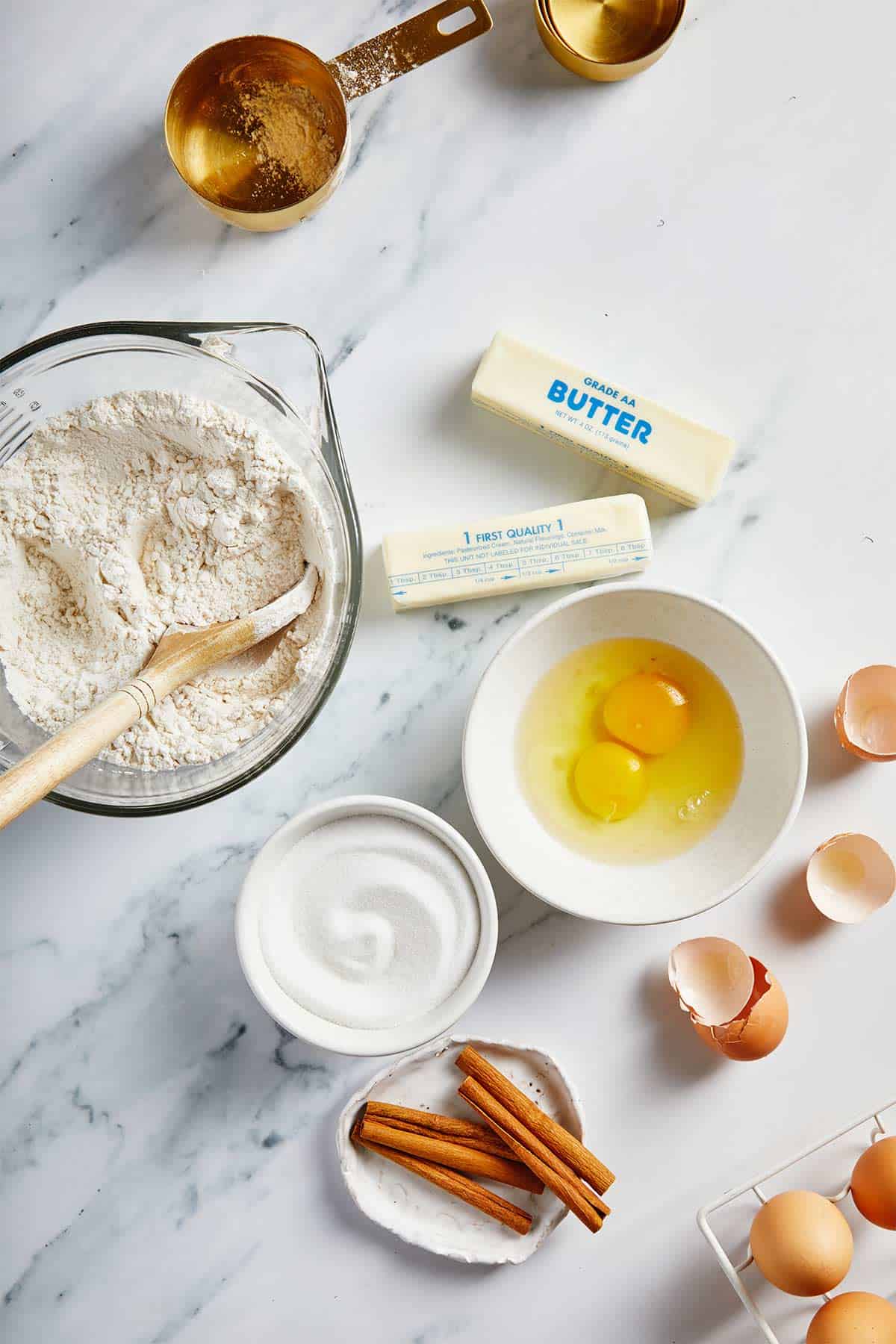 Ingredients to make cinnamon pound cake on the counter before mixing.