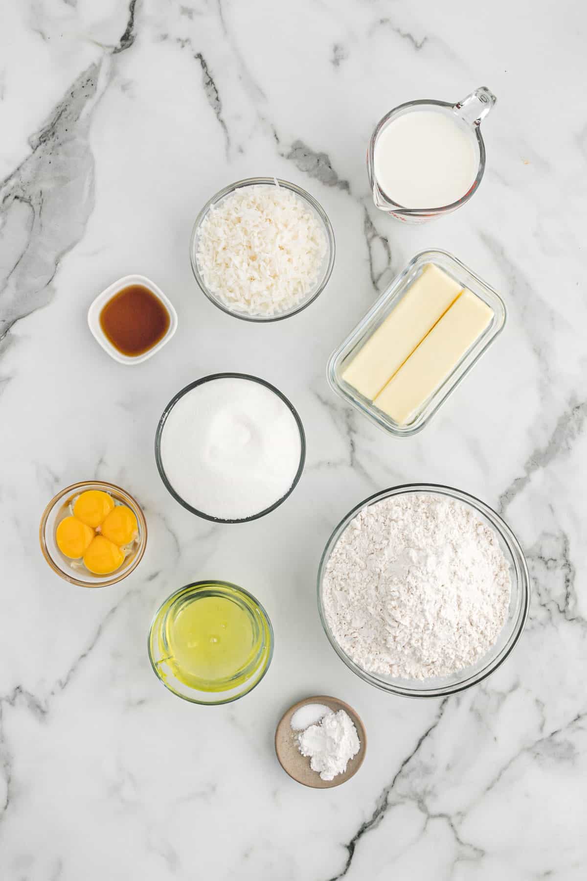 Ingredients needed to make this coconut cake recipe on the table.