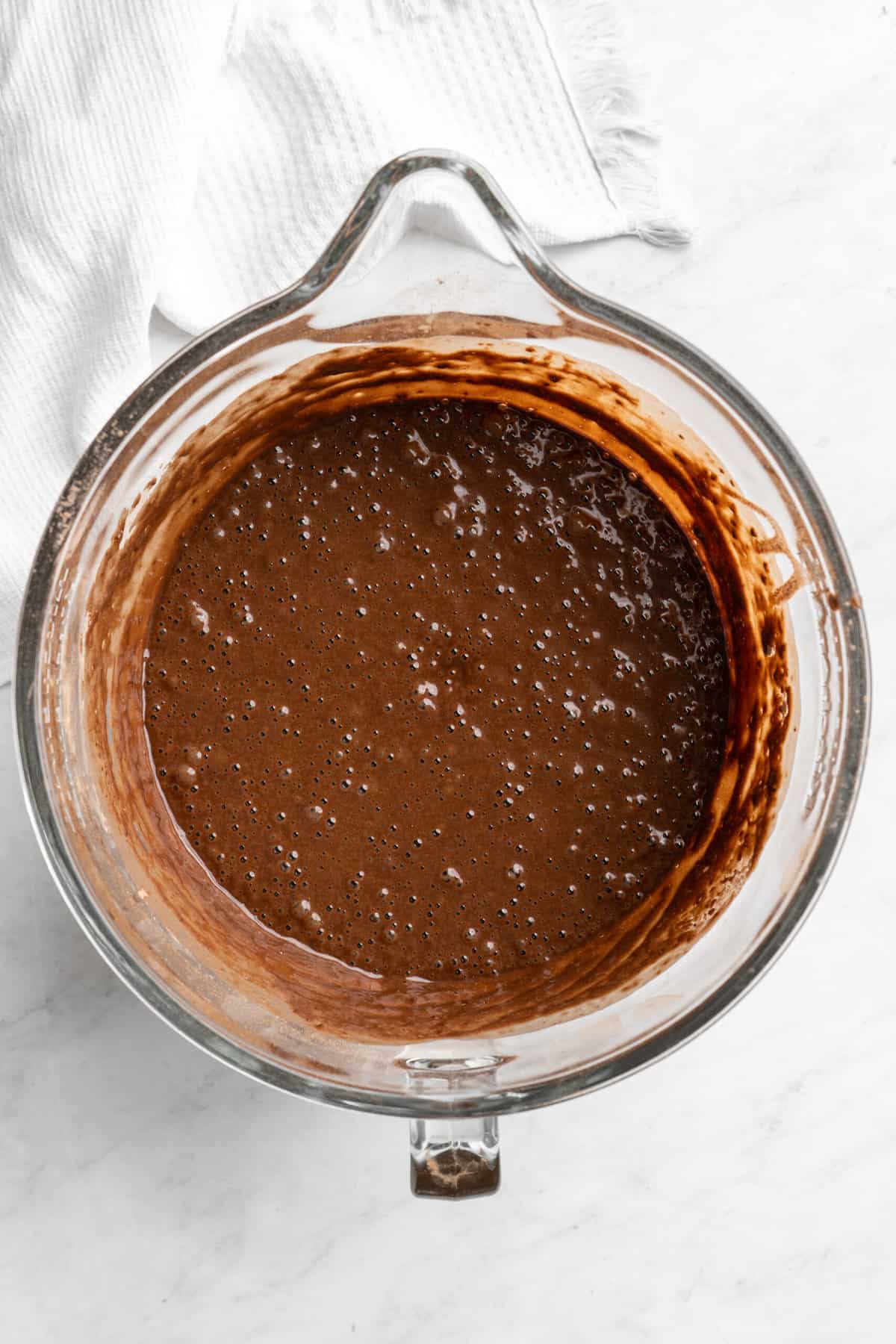 chocolate cake batter mixed in a stand mixer bowl