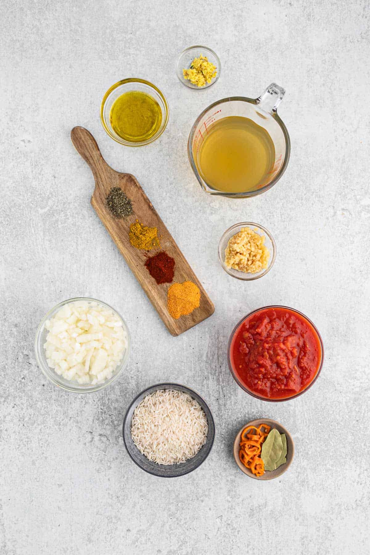 Ingredients to make jollof rice on the table.