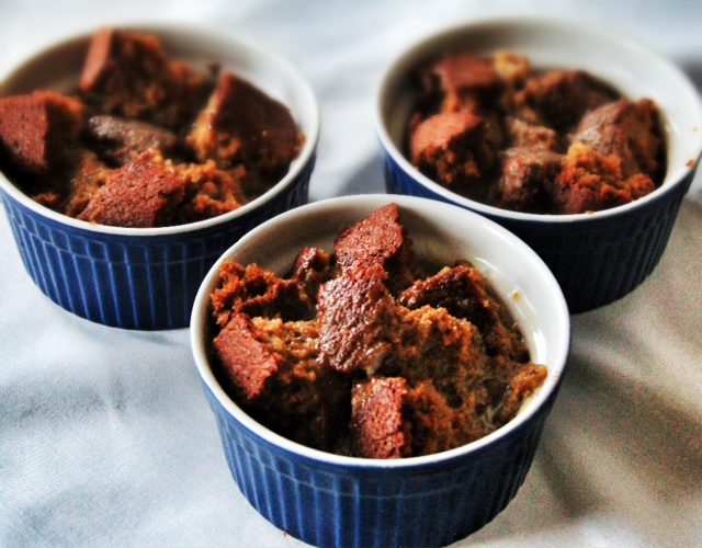 sticky toffee gingerbread bread pudding Three bowls full of gingerbread in the process of making this bread pudding recipe.