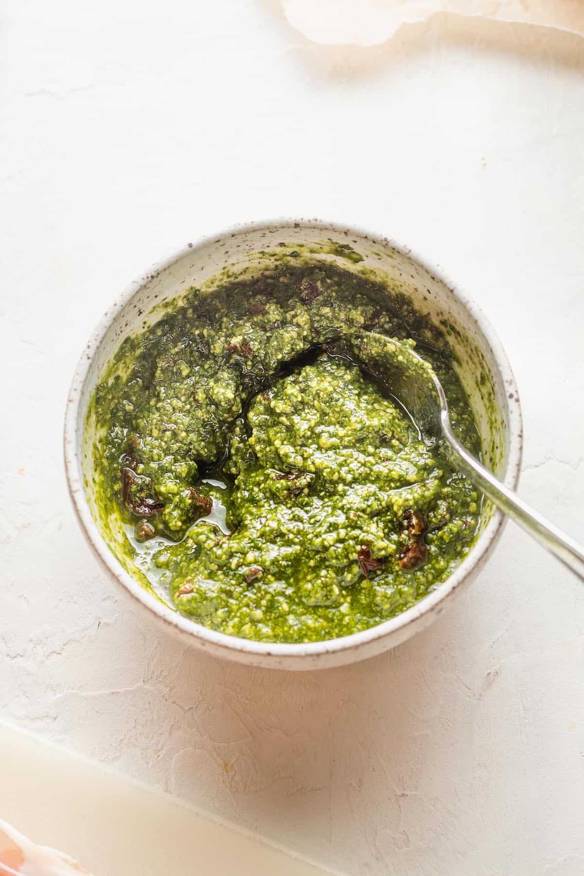 A small bowl of pesto.