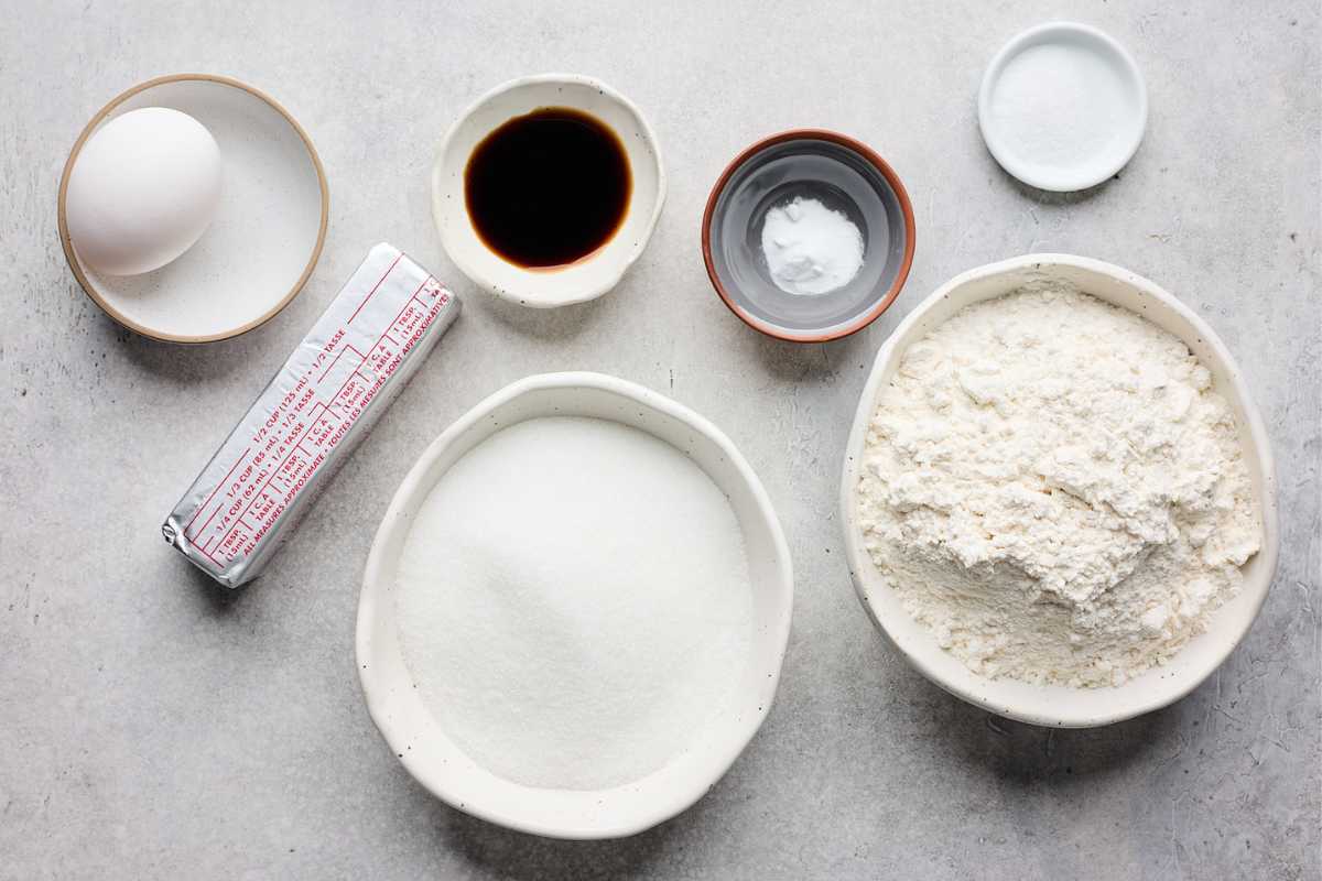 Ingredients on the table to make old fashioned tea cakes before mixing them up.