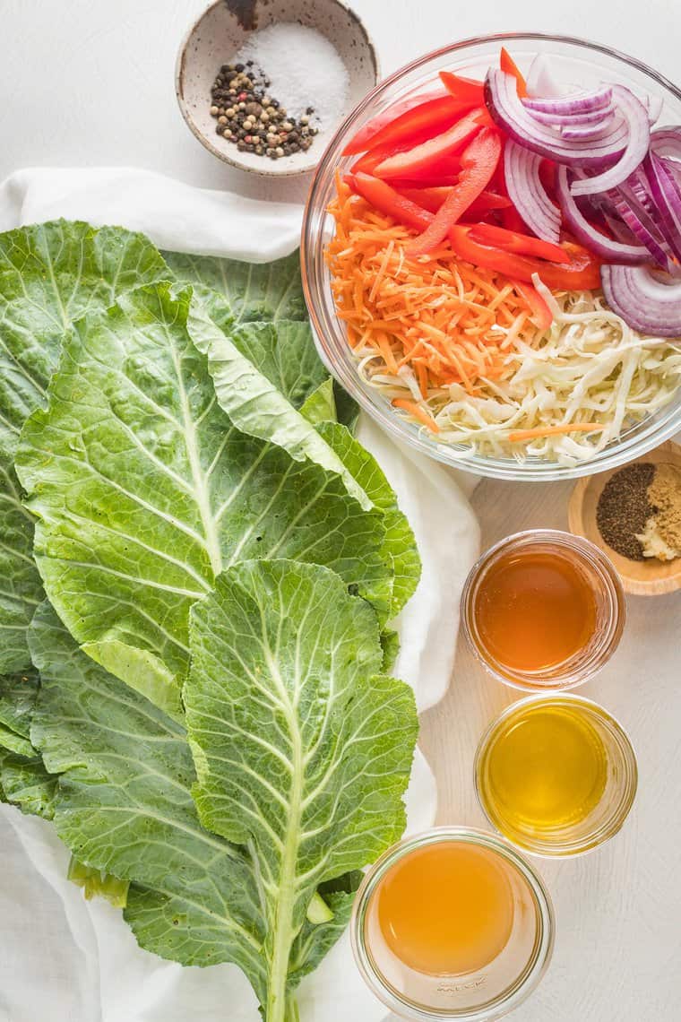 Ingredients of fresh collard greens, sliced veggies in a bowl,