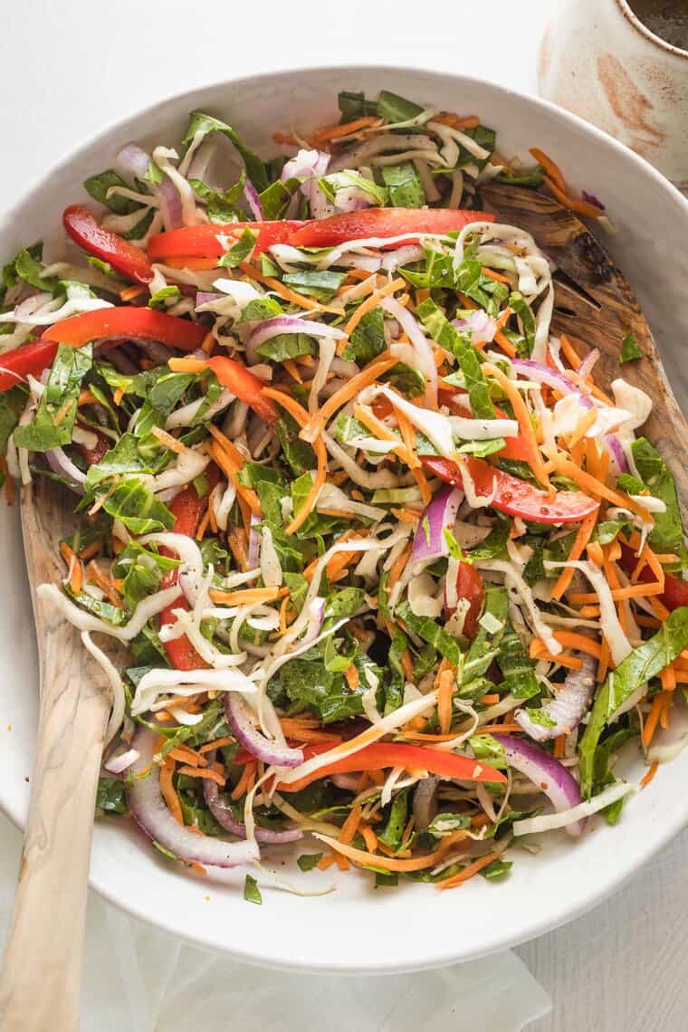 Vinegar coleslaw recipe in a large white bowl