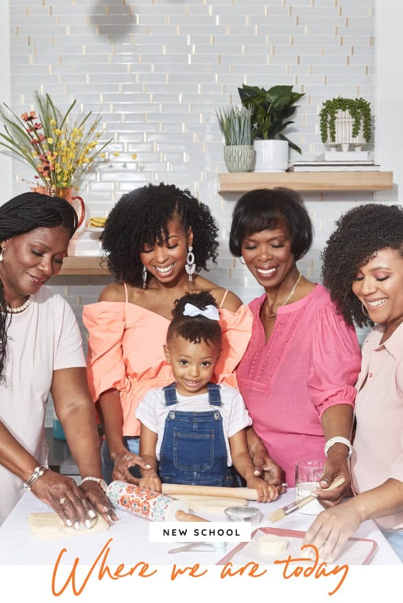 Jocelyn cutting cake with her entire family