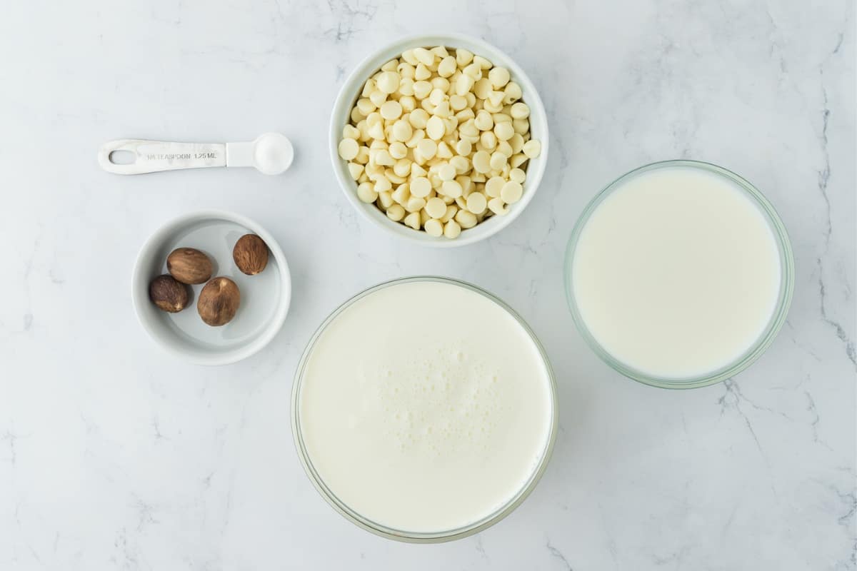 Ingredients to make white hot chocolate on the table before making.